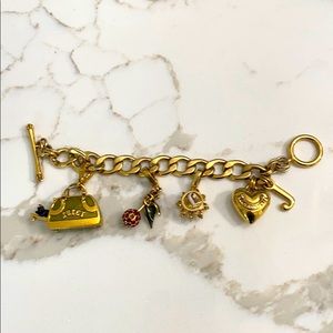 Juicy Charm bracelet with 3 additional charms.